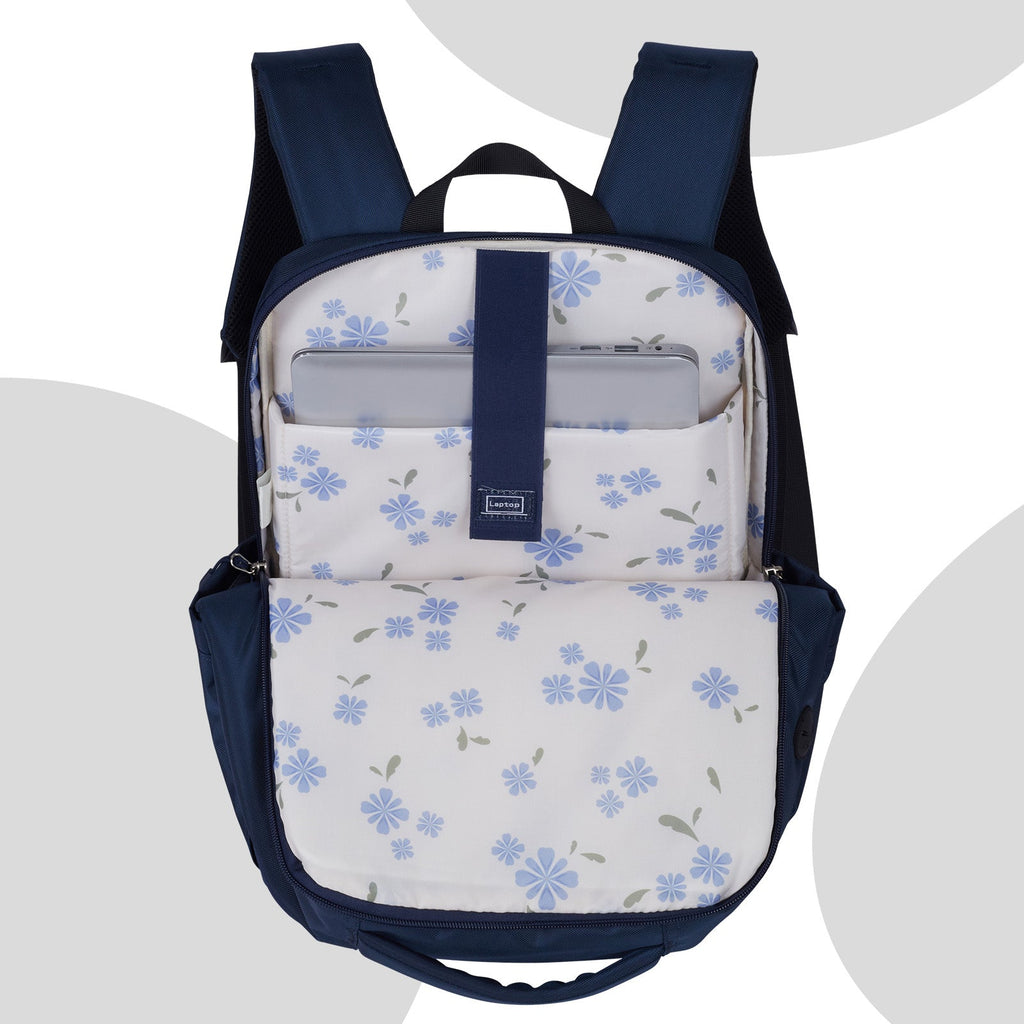 Go-Be Backpack Navy with Floral lining. Light-colored backpack lining makes it easy to find items inside. Spacious backpack with padded laptop sleeve for 15-17 inch laptops. Ergonomic laptop backpack with padded straps and breathable mesh for women or men. Sturdy zippers go down half way for easy access to contents.