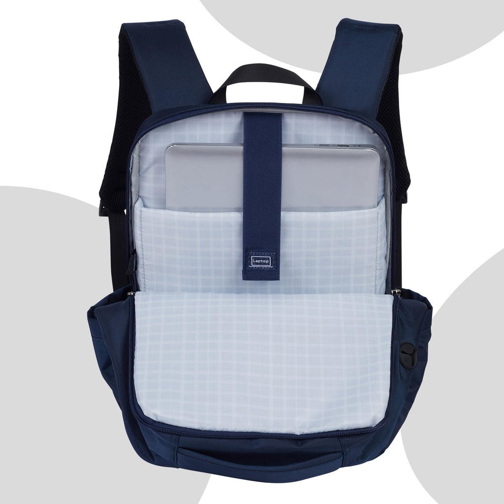 Gobe Backpack Navy with Grey lining. Light-colored backpack lining makes it easy to find items inside. Spacious backpack with padded laptop sleeve for 15-17 inch laptops. Ergonomic laptop backpack with padded straps and breathable mesh for women or men. Sturdy zippers go down half way for easy access to contents.