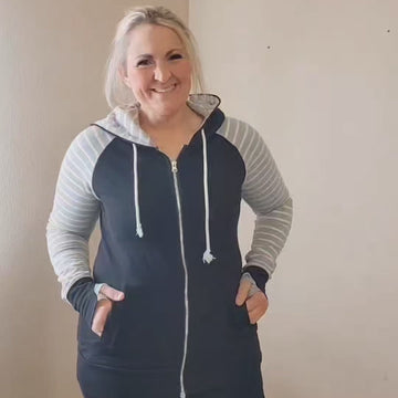 Varsity Black Full Zip Woman's Hoodie Video, black body with grey and white stripe sleeves and accents, long sleeve womens hoodie, extra large hood, shown in size large - Shop7degrees